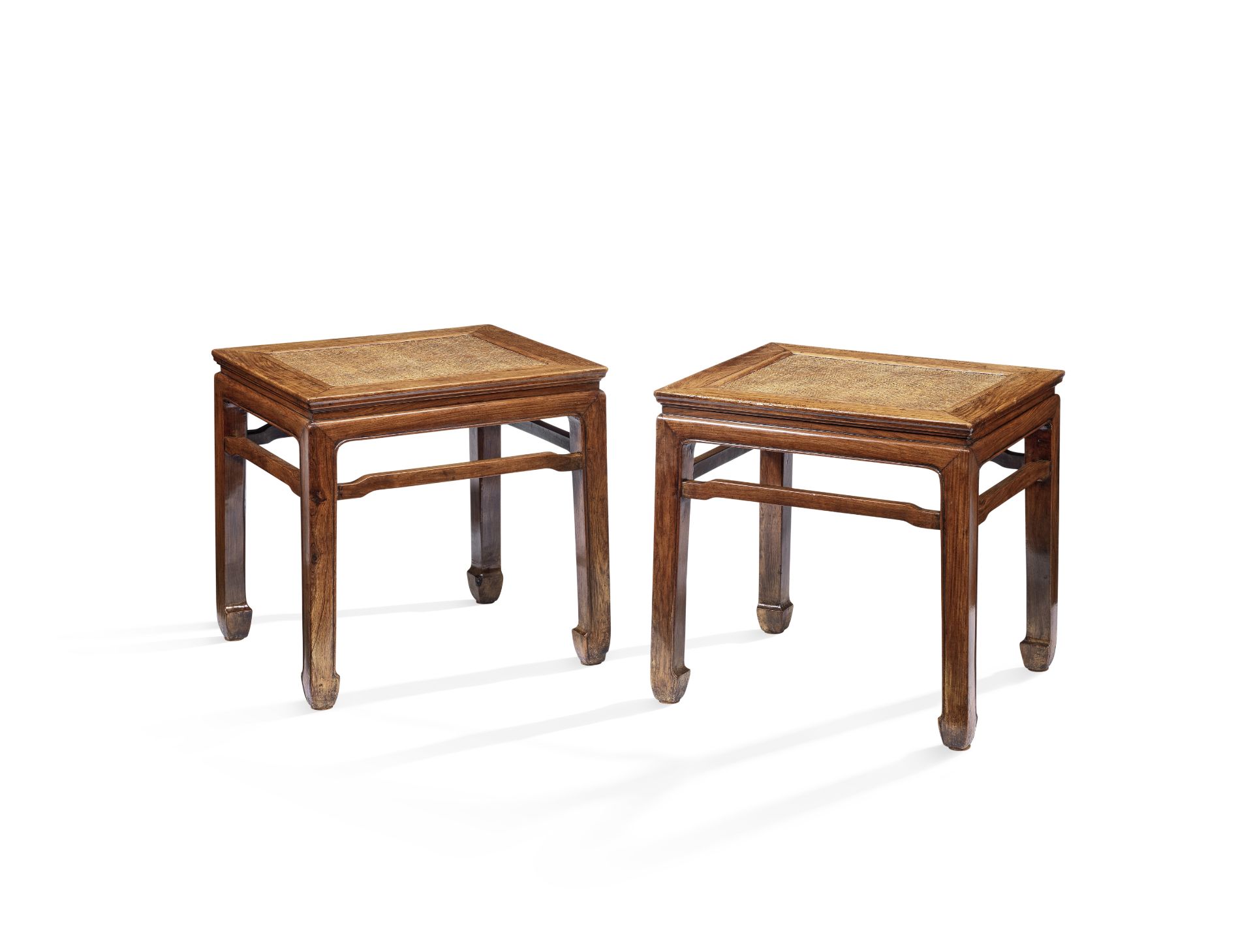 A RARE PAIR OF HUANGHUALI WAISTED CORNER-LEG STOOLS, FANGDENG 17th century (2)