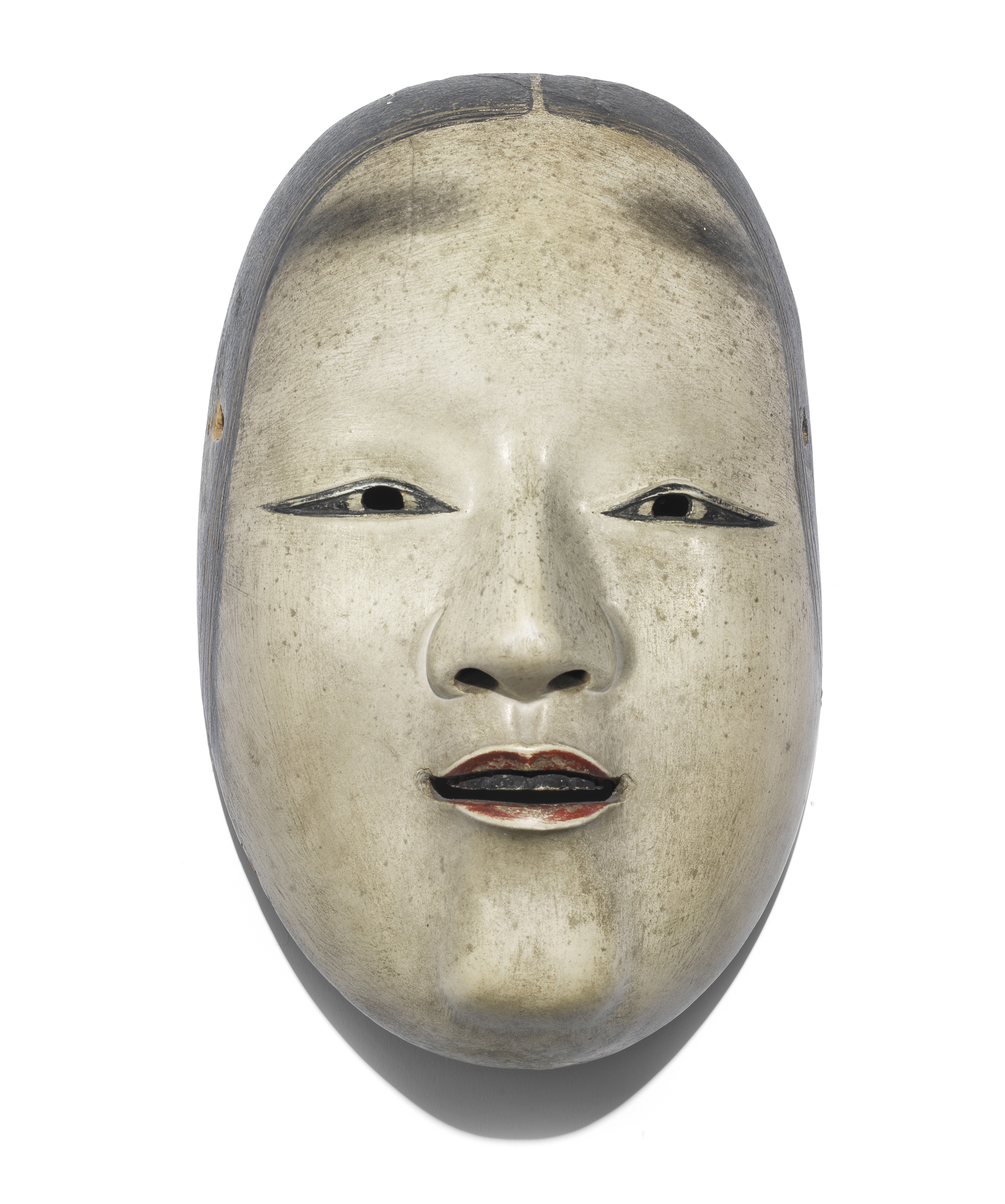 A CARVED WOOD NOH MASK OF KO-OMOTE ('LITTLE FACE') Anonymous, Edo Period (1615-1868), probably 19...