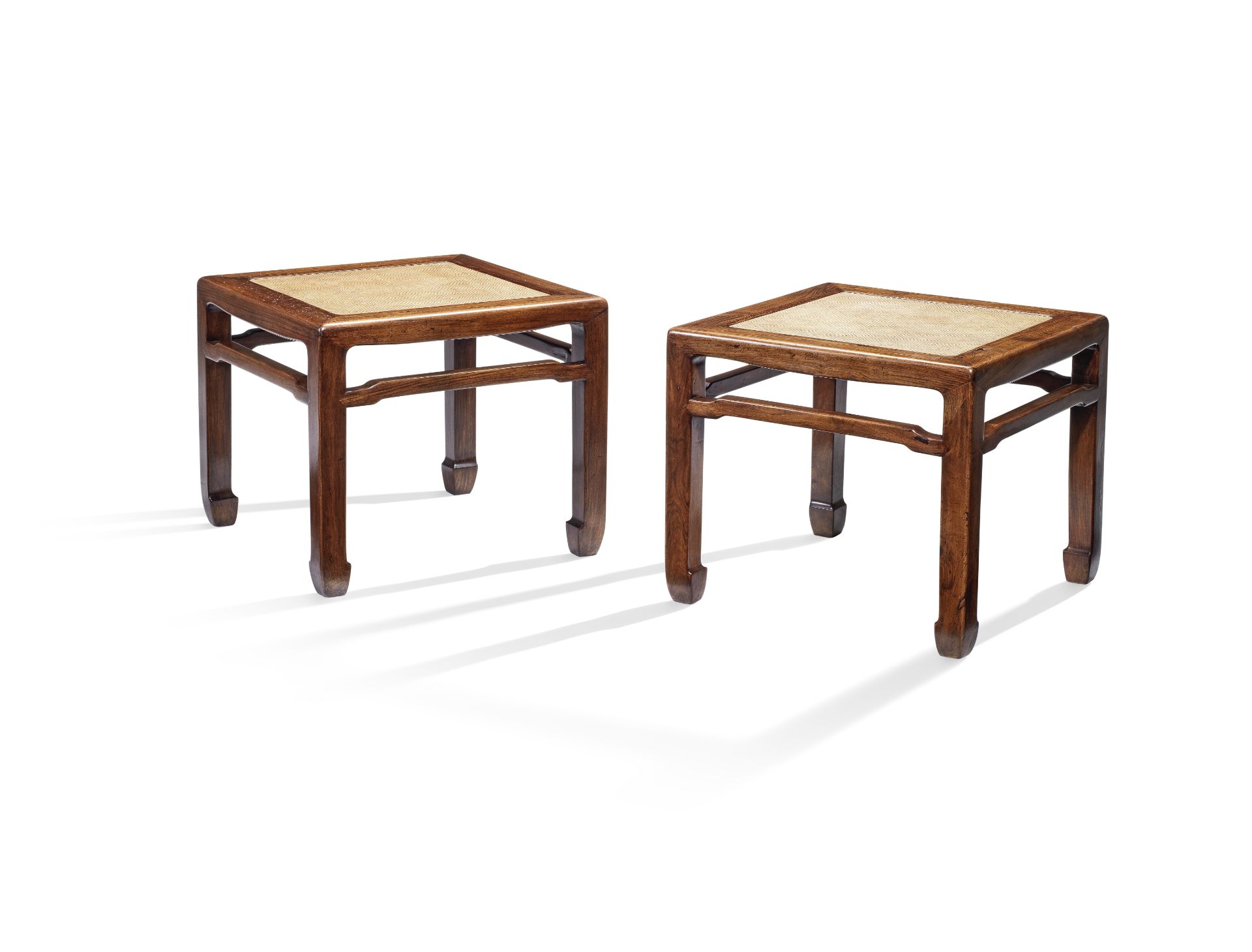 A FINE PAIR OF HUANGHUALI WAISTED CORNER-LEG STOOLS, FANGDENG 17th/18th century (2)