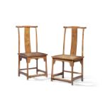 A FINE AND RAIR PAIR OF HUANGHUALI 'LAMPHANGER' CONTINUOUS YOKEBACK CHAIRS, DENGGUAYI 17th centur...