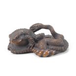 A large boxwood netsuke of a toad and snake By Masanao, Ise, Yamada, Edo period (1615-1868), mid...