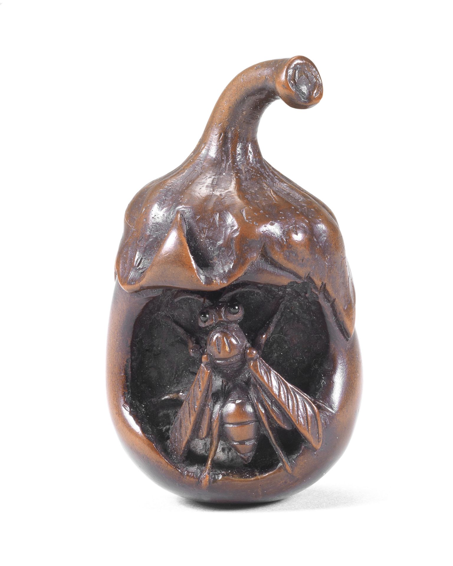 A netsuke of a wasp in a nasubi (aubergine) By Kogetsu, Edo period (1615-1868), early 19th century