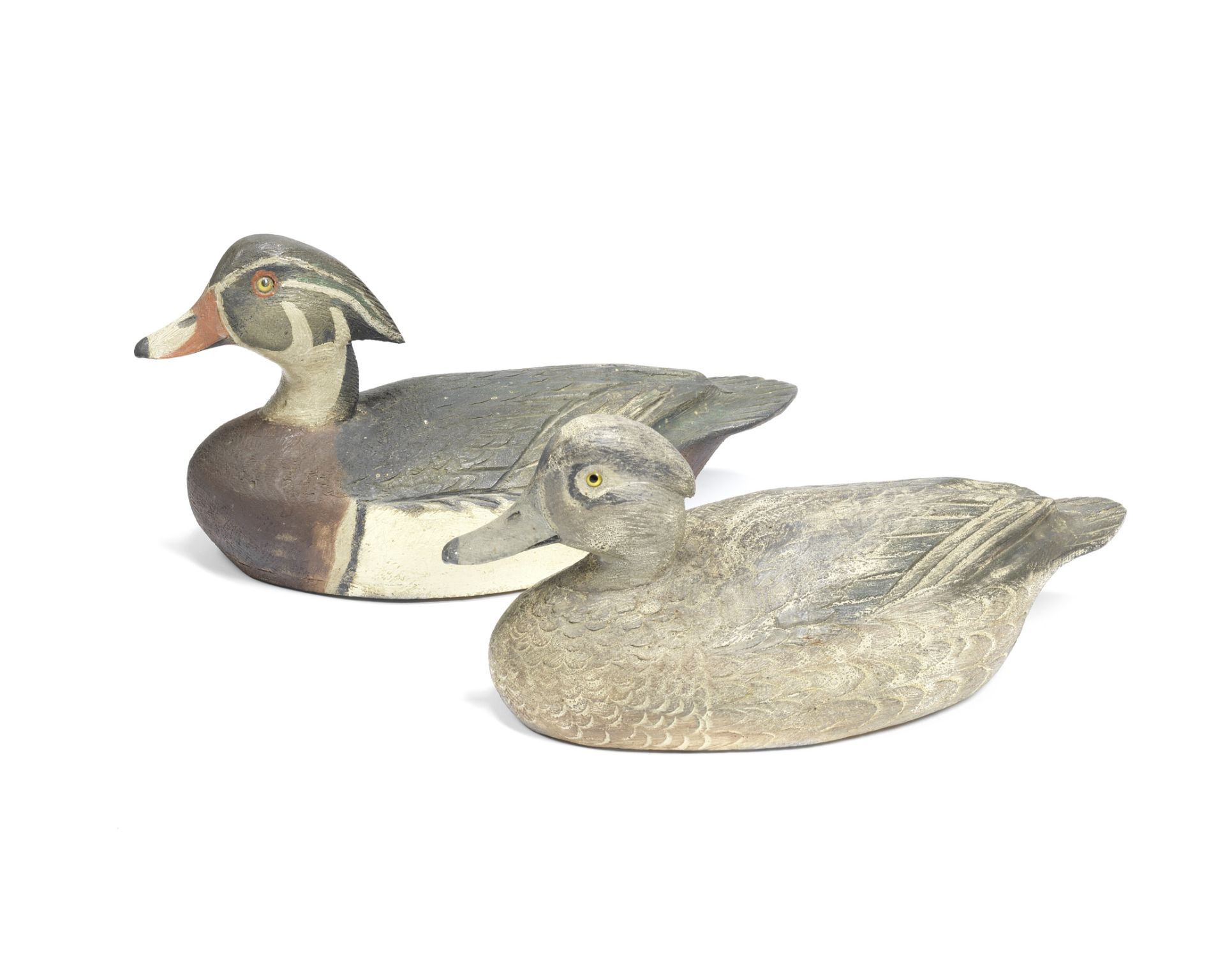 A fine pair of wooden Carolina duck decoys by Ben Schmidt