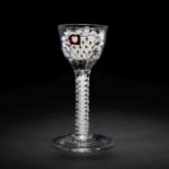 The Surtees Marriage Glasses: a very fine enamelled armorial wine glass from the Beilby workshop,...