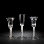 Two similar opaque twist wine glasses and an ale flute, circa 1765