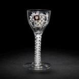 The Surtees Marriage Glasses: a rare enamelled armorial wine glass from the Beilby workshop, circ...