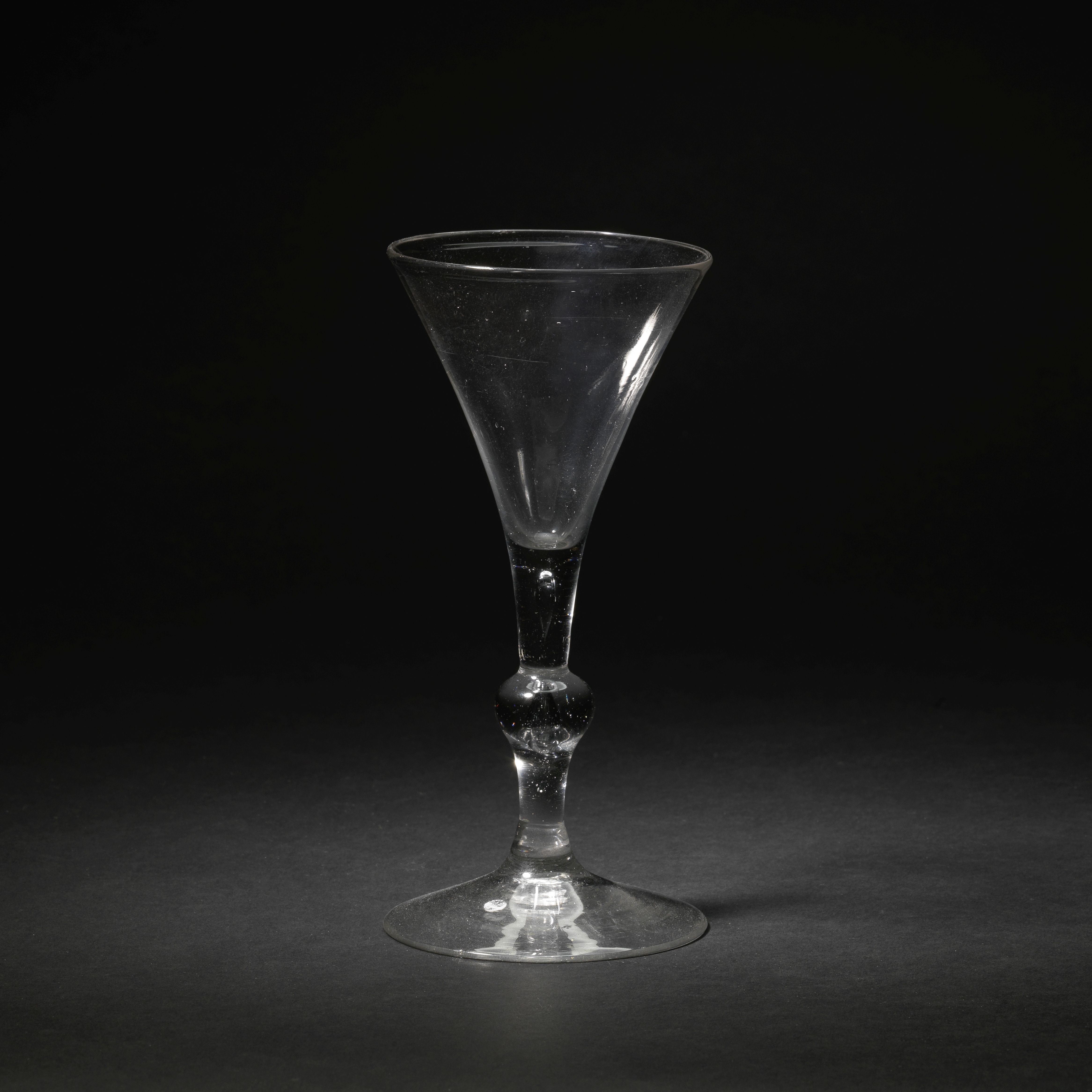 A light baluster wine glass, circa 1740