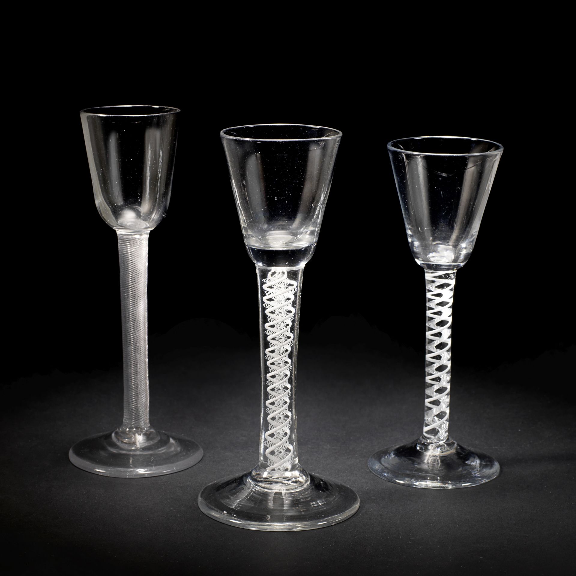 Two cordial glasses and a wine glass with twist stems, circa 1755-65