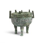 A RARE ARCHAIC BRONZE TRIPOD RITUAL FOOD VESSEL AND COVER, DING Middle Western Zhou Dynasty (3)