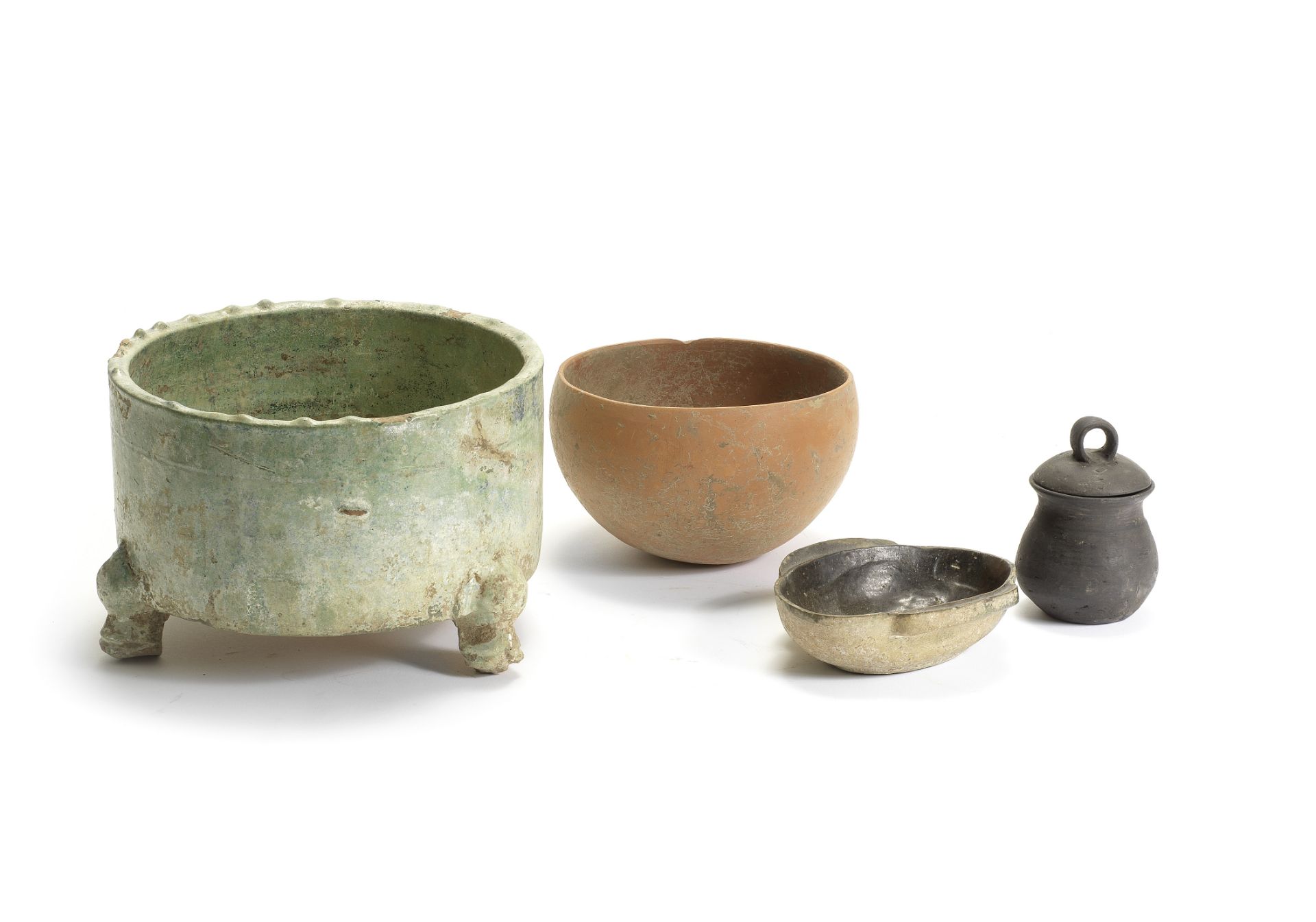 FOUR EARLY POTTERY VESSELS (5)