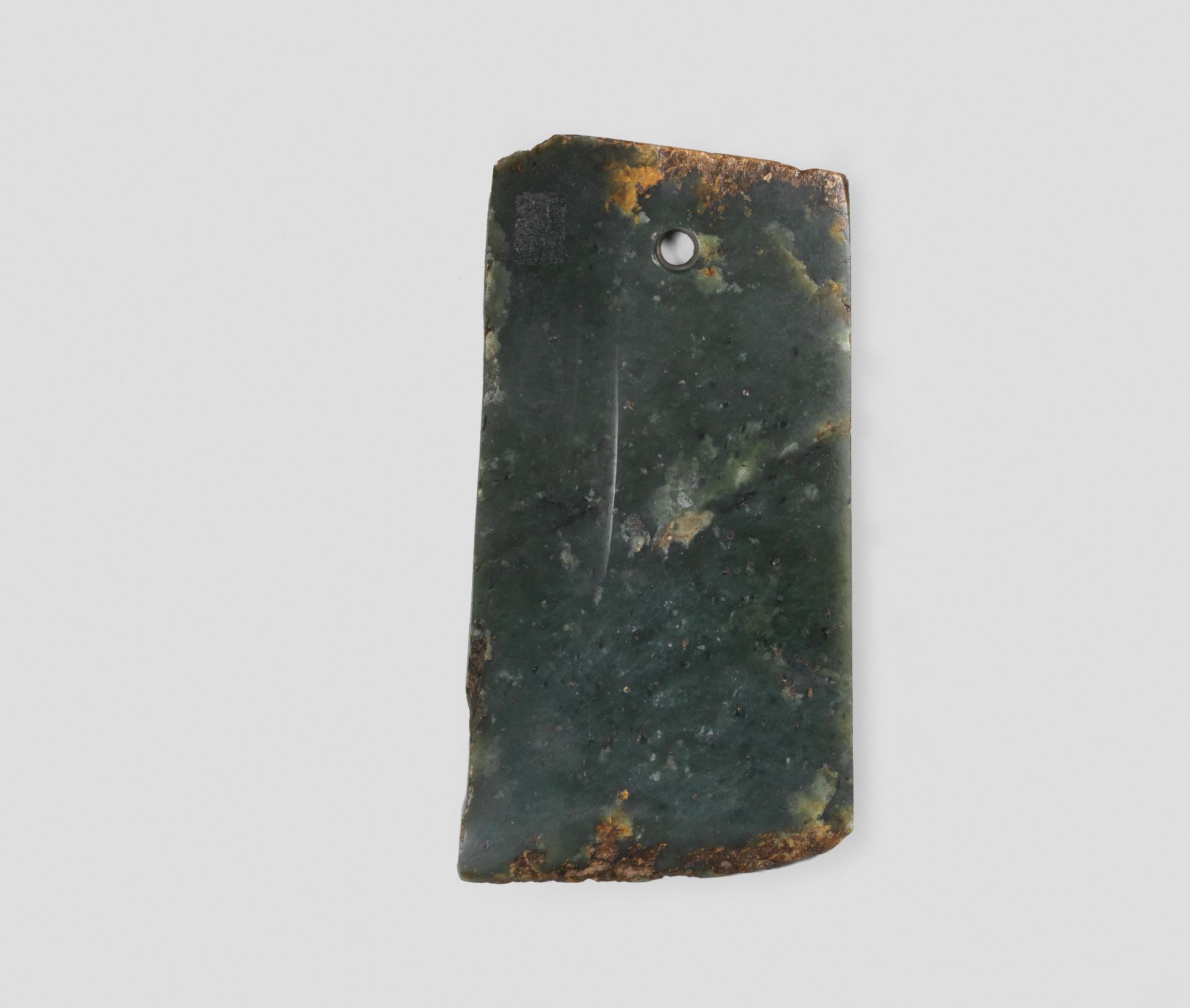 A RARE ARCHAIC SPINACH-GREEN JADE AXE BLADE, GE Neolithic Period