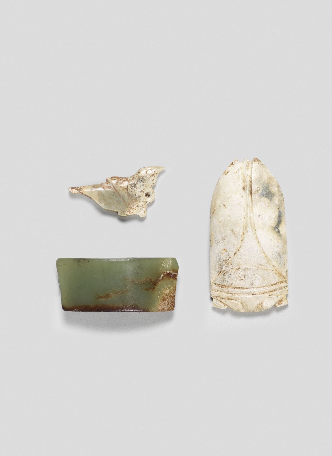 A RARE ARCHAIC JADE CARVING OF A BIRD Western Zhou Dynasty (3)