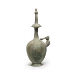 A BRONZE RITUAL WATER-POURING VESSEL, KUNDIKA Tang Dynasty