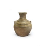 A YUEYAO OLIVE-GREEN-GLAZED STONEWARE VASE Western Jin Dynasty