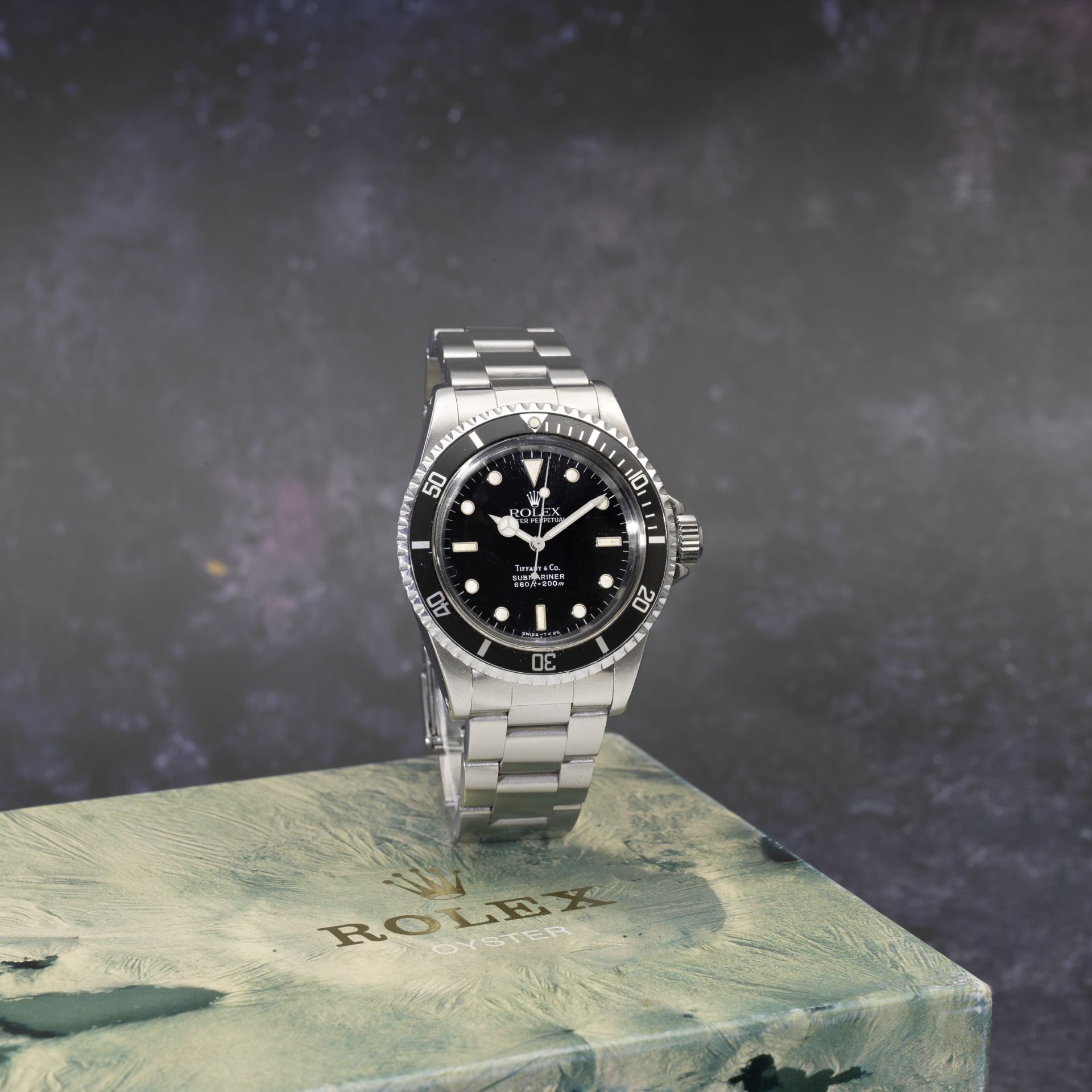 Rolex. A stainless steel automatic bracelet watch with Tiffany signed dial Submariner, Ref: 5513...