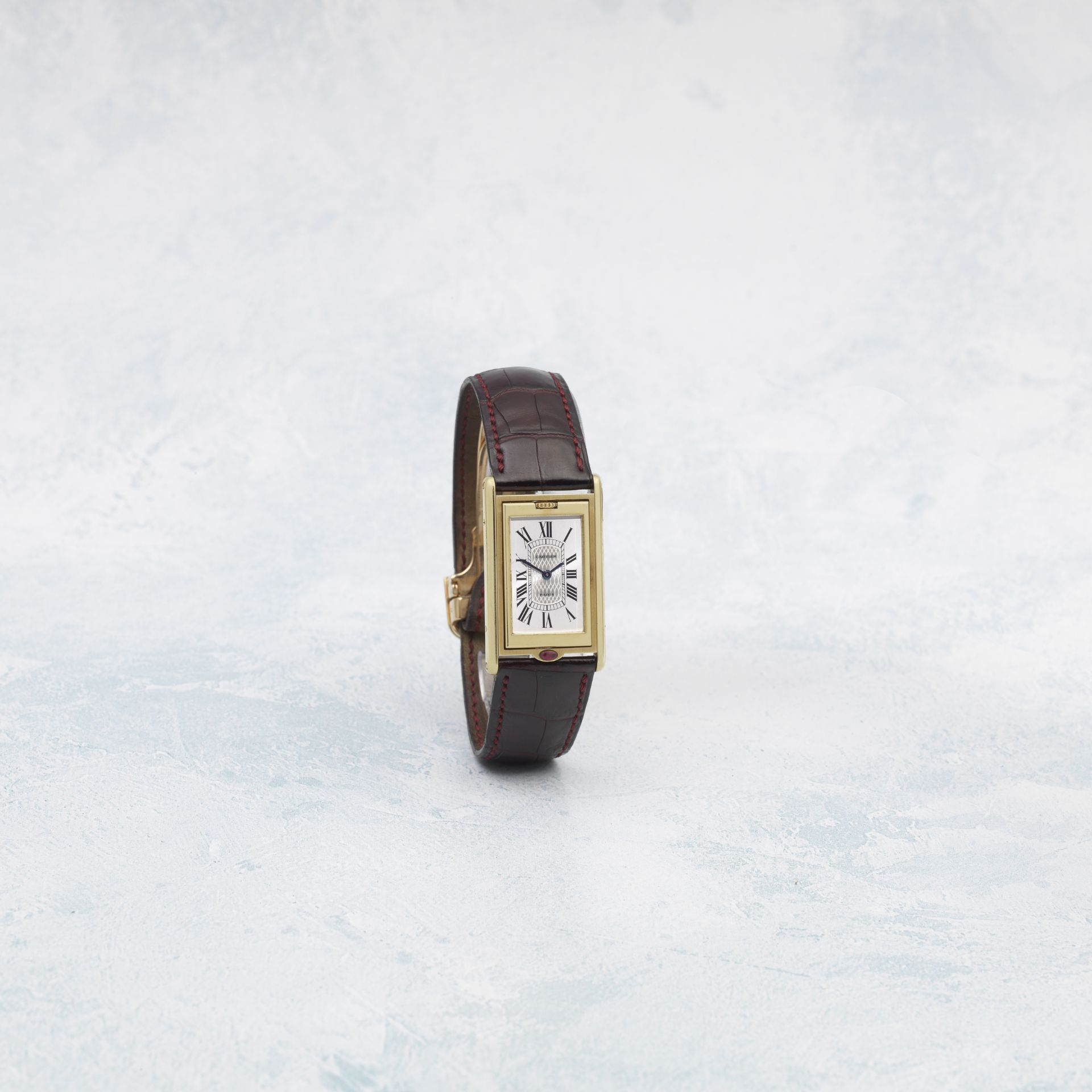 Cartier. A Limited Edition 18K gold manual wind reversible rectangular wristwatch Tank Basculant...