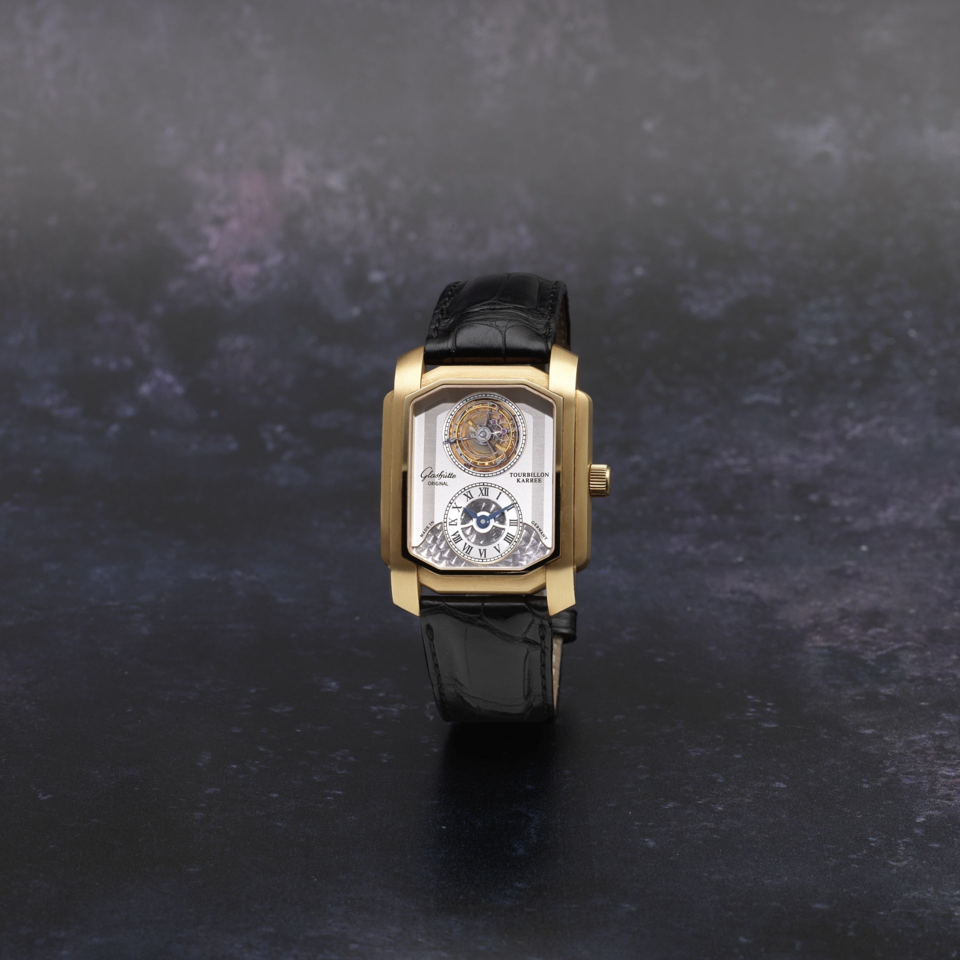 Glash&#252;tte Original. A fine and unusual 18K rose gold manual wind tourbillon rectangular wris...