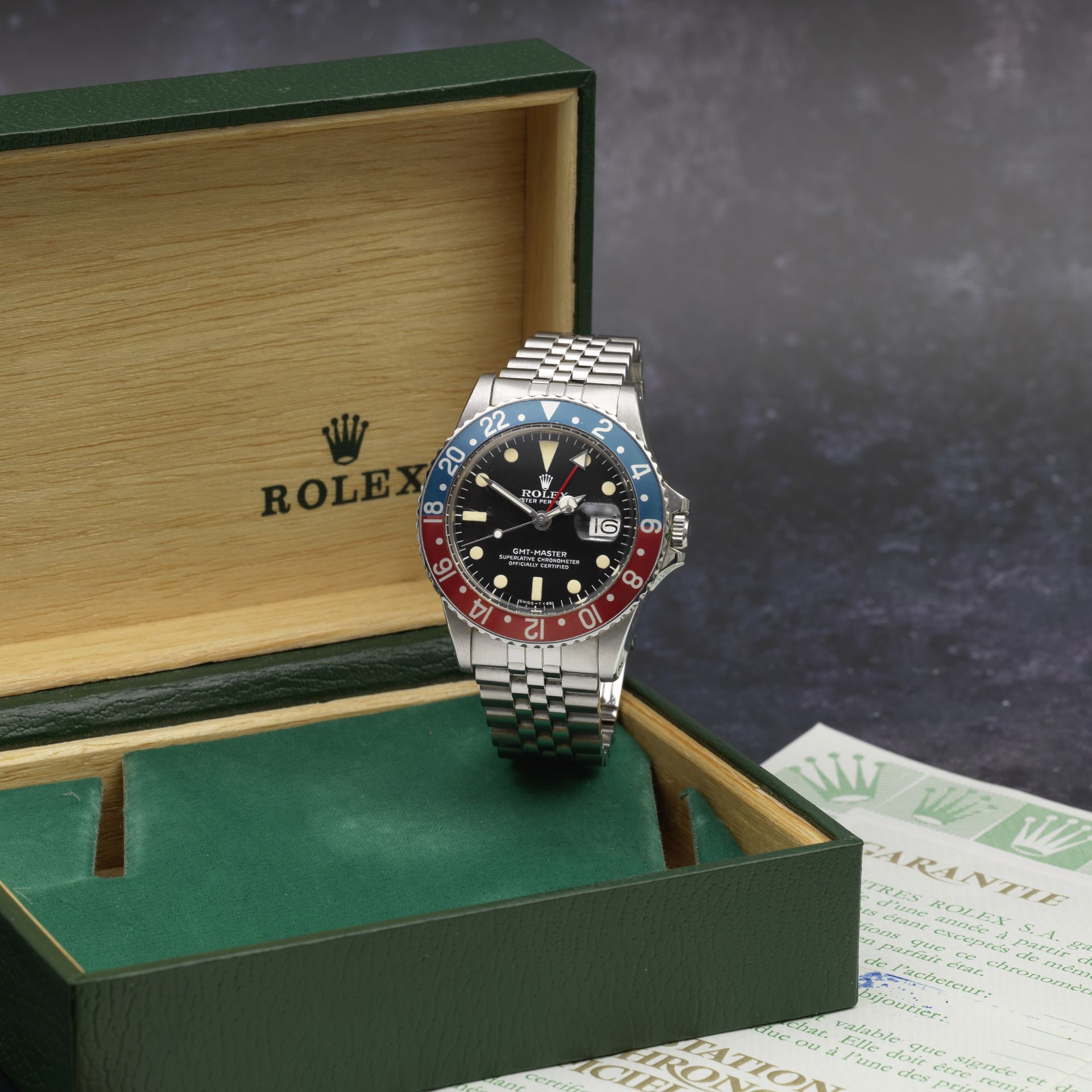 Rolex. A stainless steel automatic calendar bracelet watch with dual time zone GMT Master 'Pepsi...