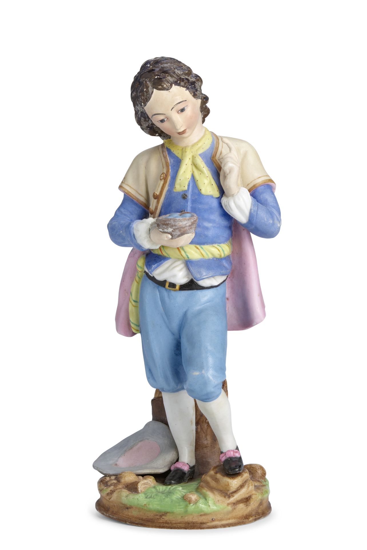 A large porcelain figure of a young page boy holding a bird nestGardner Porcelain Factory, Verbil...
