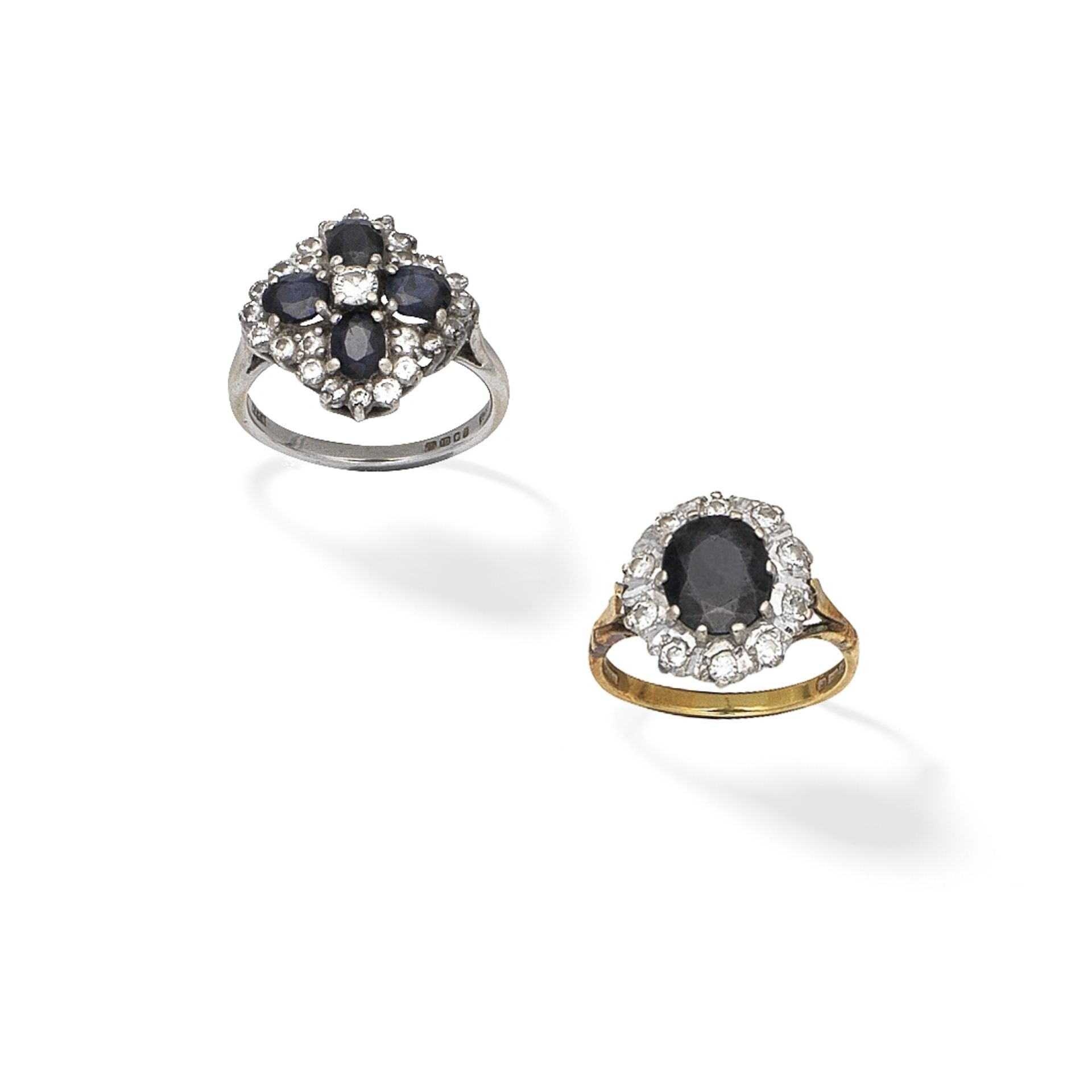 TWO SAPPHIRE AND DIAMOND-SET CLUSTER RINGS (2)