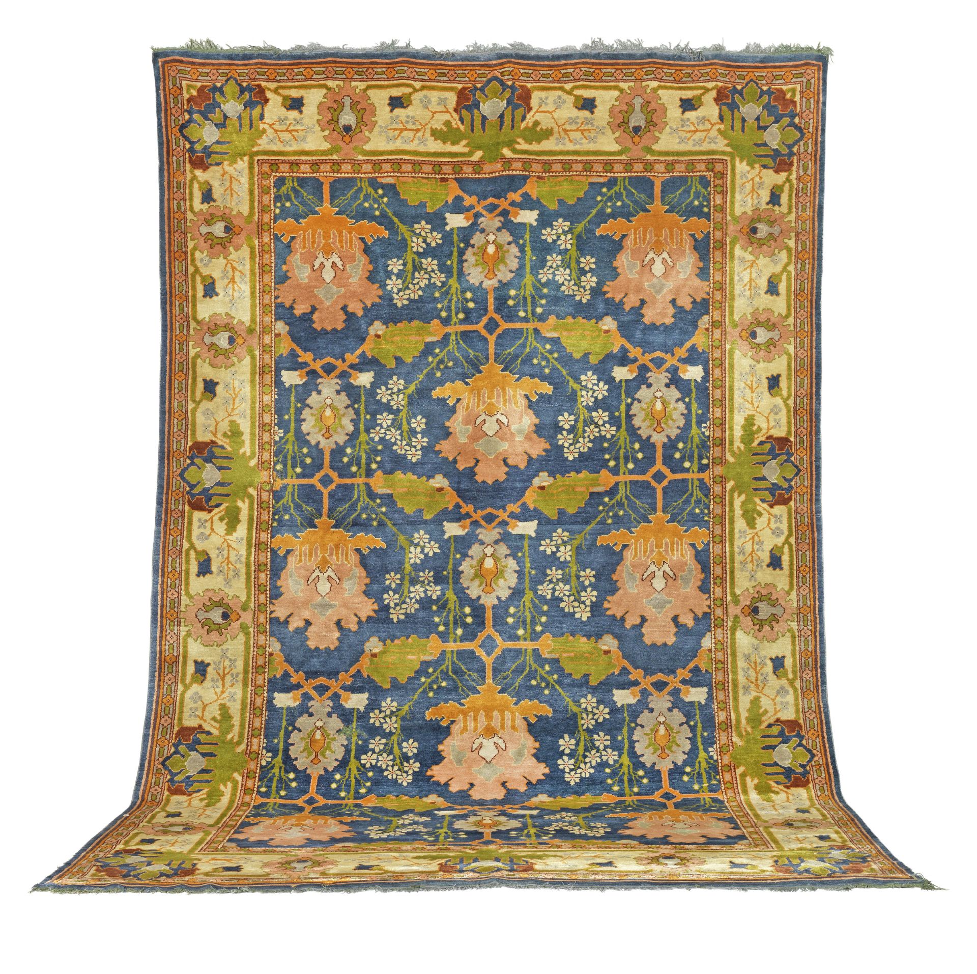 A vibrant Gavin Morton Donegal carpet early 20th century 560cm x 360cm approximately