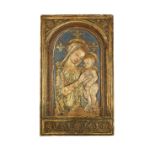 An Italian polychrome and gilt 'Cartapesta' arched figural relief of the Virgin and Christ Child ...