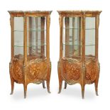 A pair of French late 19th century ormolu mounted kingwood, bois satine and marquetry bombe serpe...