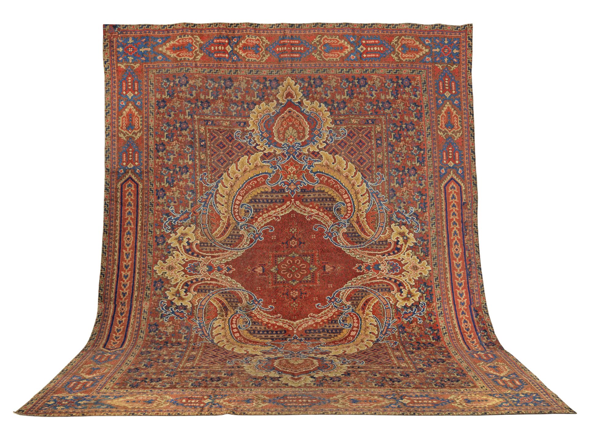A striking Axminster carpet with central medallion England 641cm x 484cm
