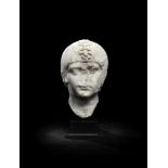 A Roman marble portrait head of a boy