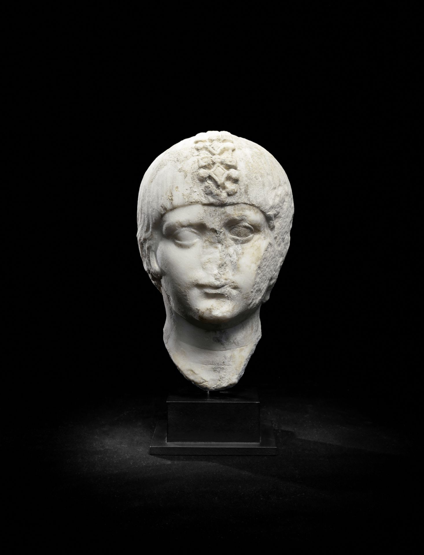 A Roman marble portrait head of a boy