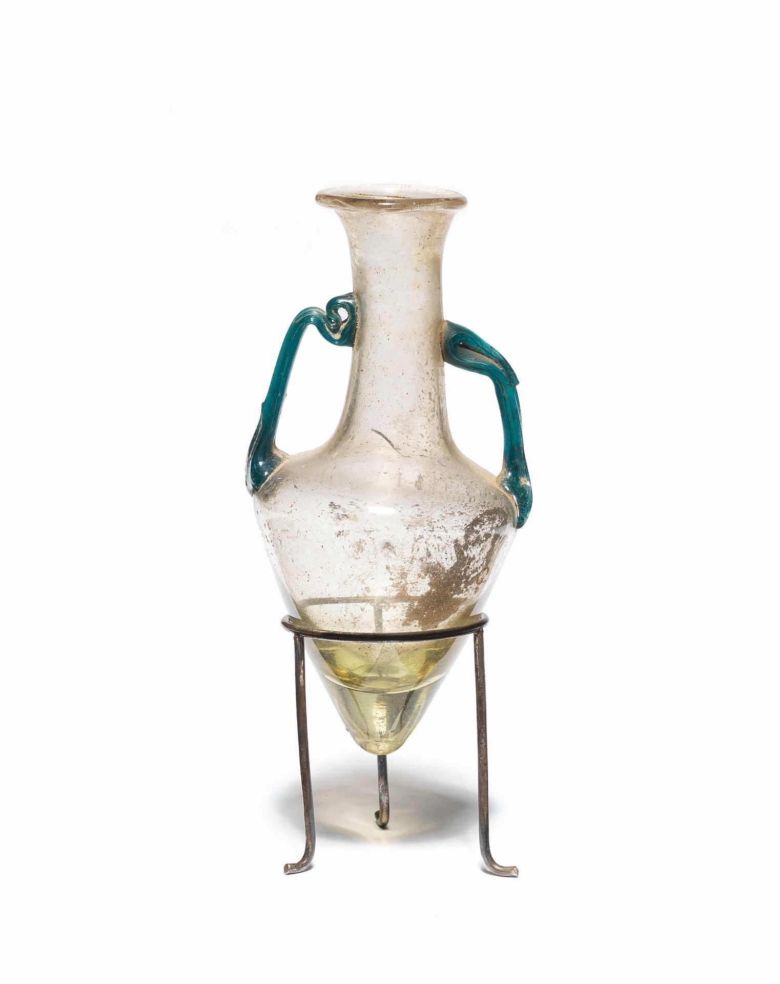 A Roman pale green glass amphoriskos