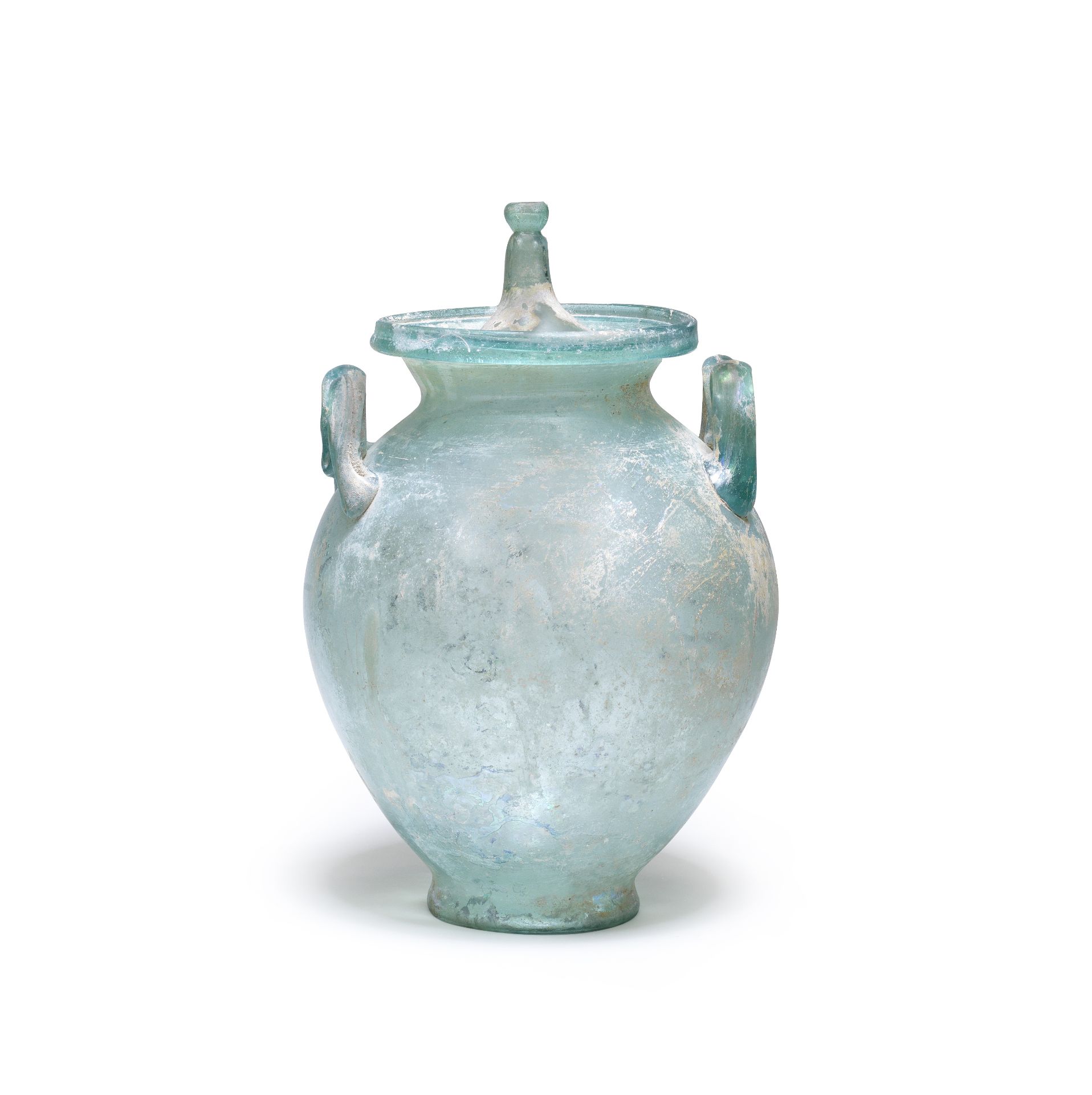 A Roman blue-green glass lidded cinerary urn