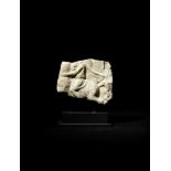 A Roman marble relief fragment
