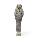 An Egyptian turquoise glazed composition shabti for Heneb-Heneb