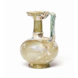 A Roman yellow-green glass jug