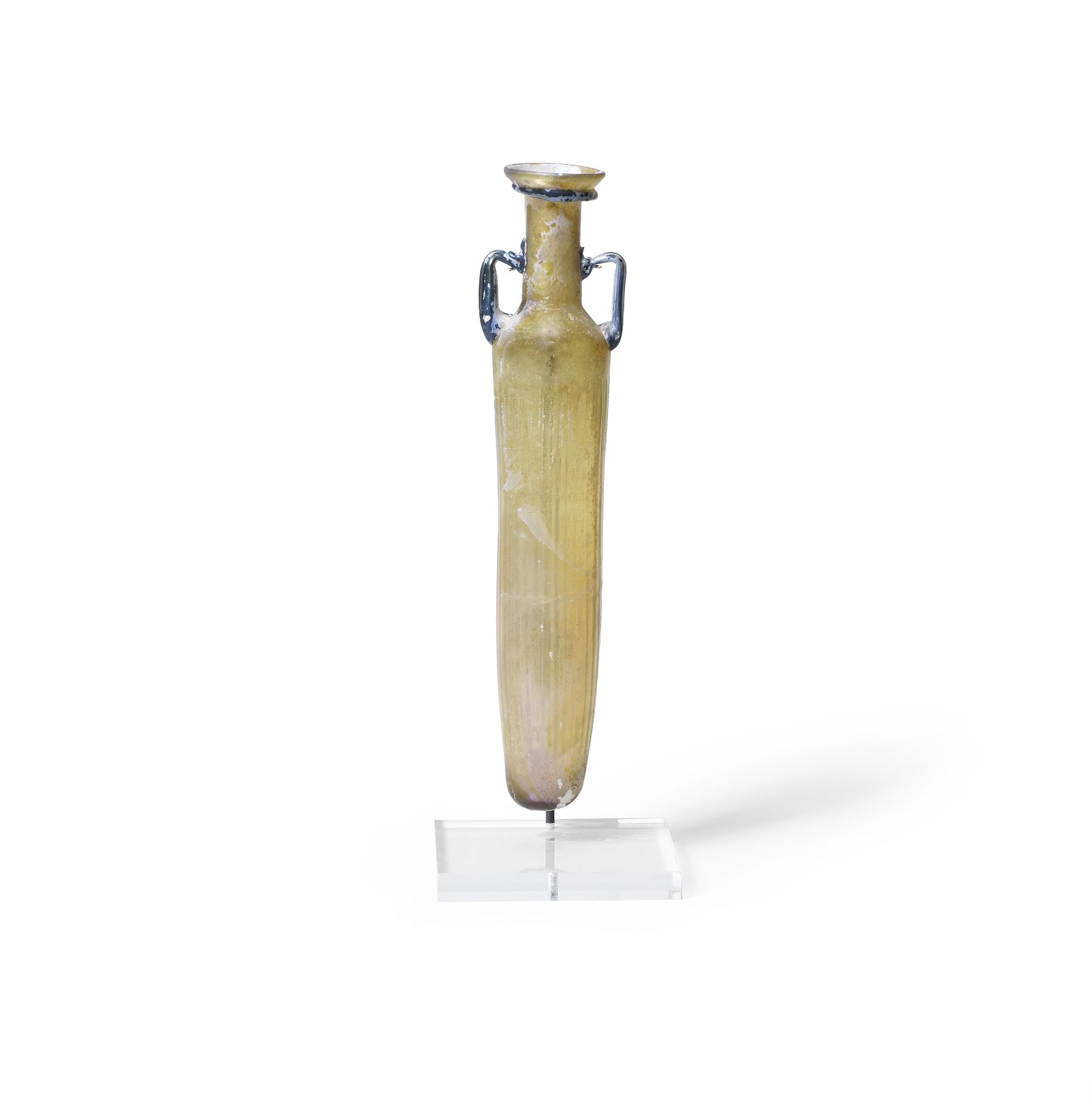 A Roman amber glass flask