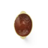 A Roman gold and carnelian intaglio ring with a bust of Artemis