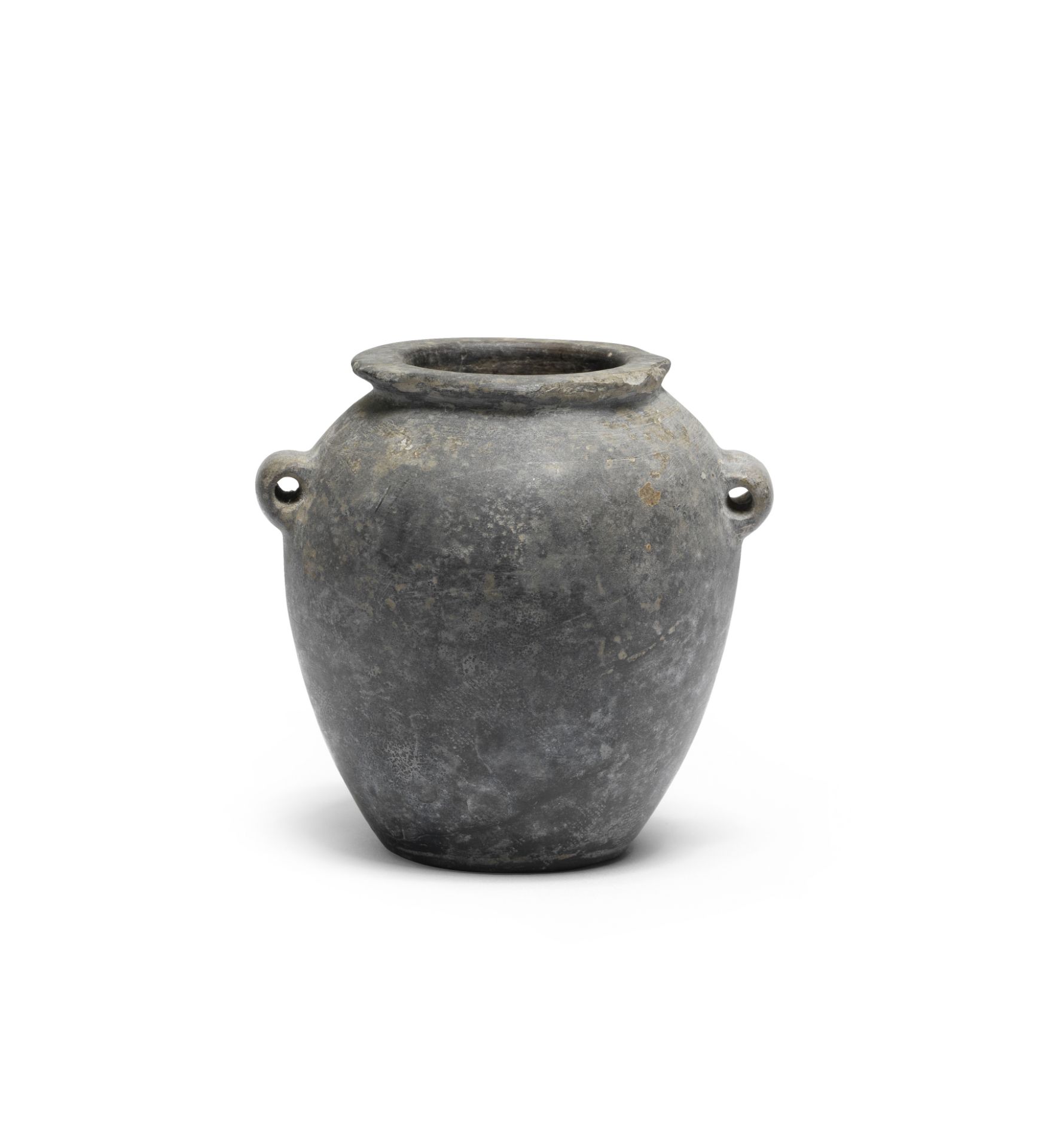 An Egyptian basalt jar 1