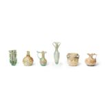 Six Roman green glass vessels 6