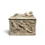 An Etruscan terracotta cinerary urn and lid