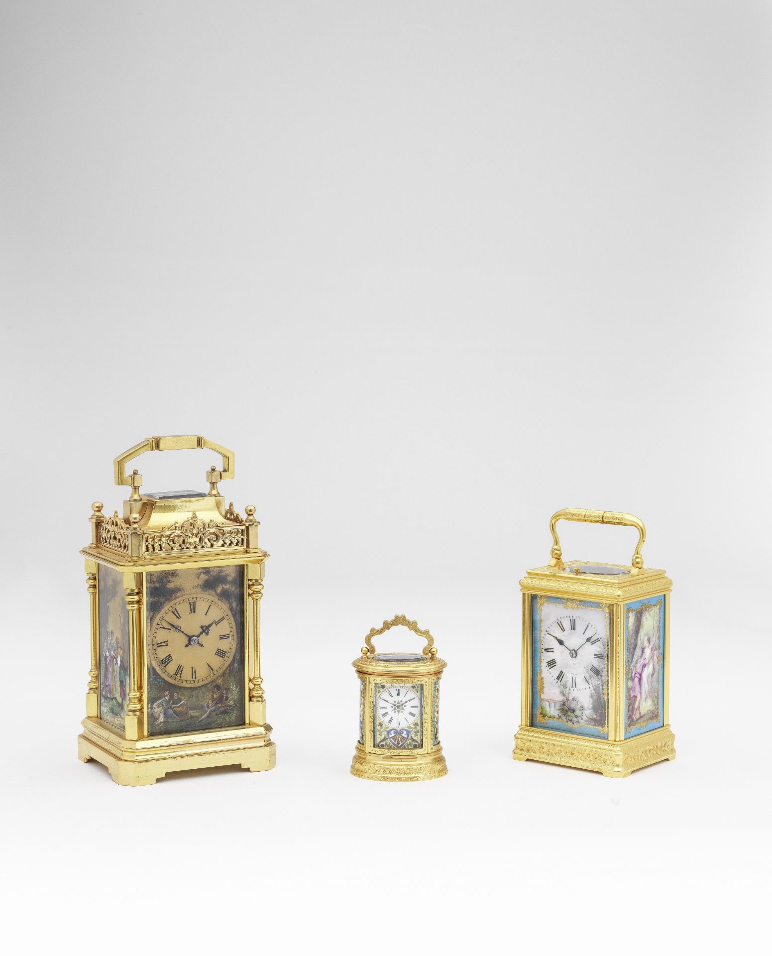 A good late 19th century French engraved brass repeating carriage clock with three porcelain pane...