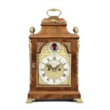 'Mirth and Magick' A mahogany and brass mounted table clock with rare rocking figure in the arch ...