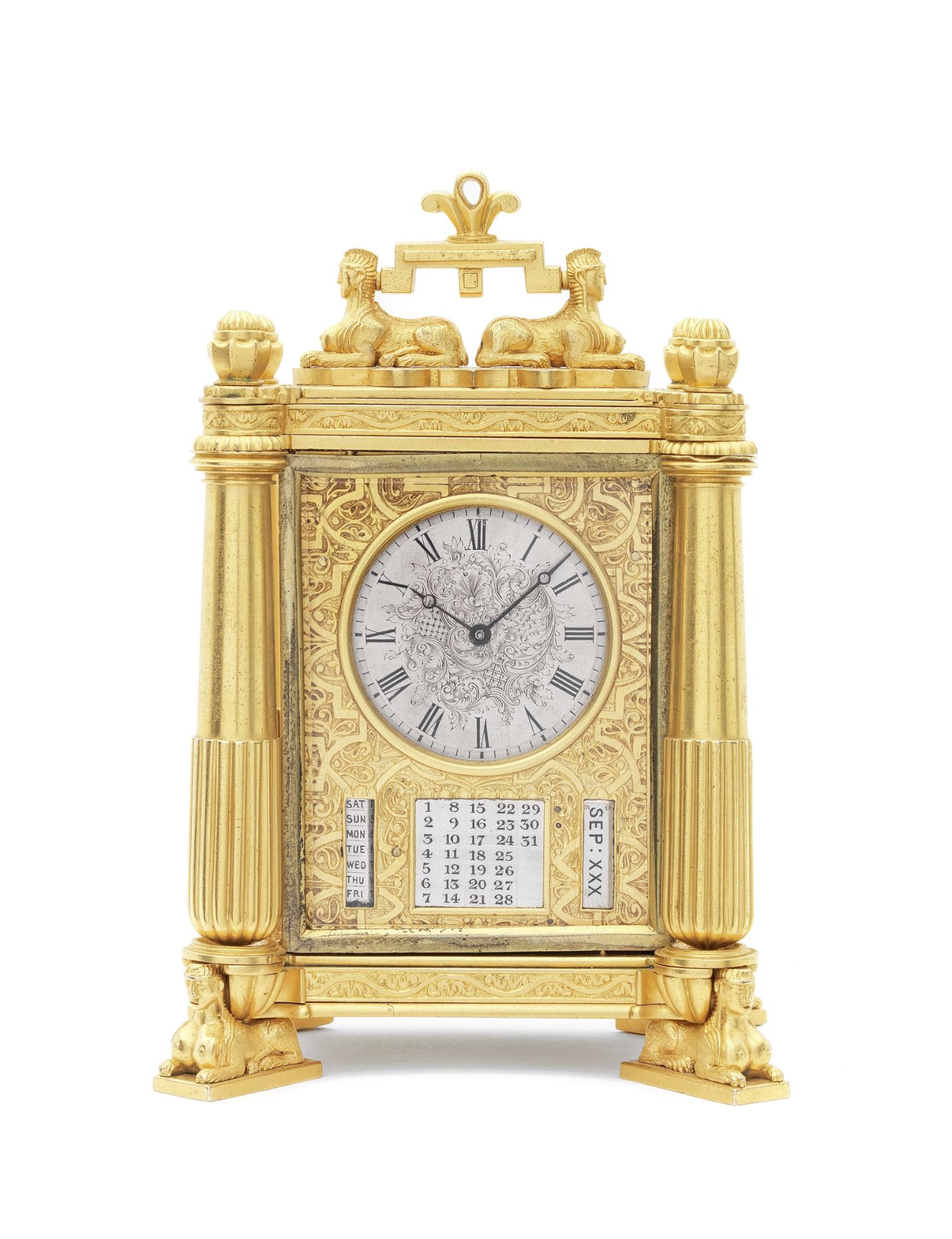 A Fine mid 19th century English gilt and engraved brass Egyptian style timepiece with calendar, i...