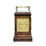 A rare early 19th century rosewood travel clock with soft/loud strike function Emanuel Brothers,...