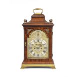 A good mid 18th century brass-banded mahogany quarter-repeating table clock William Nightingale,...