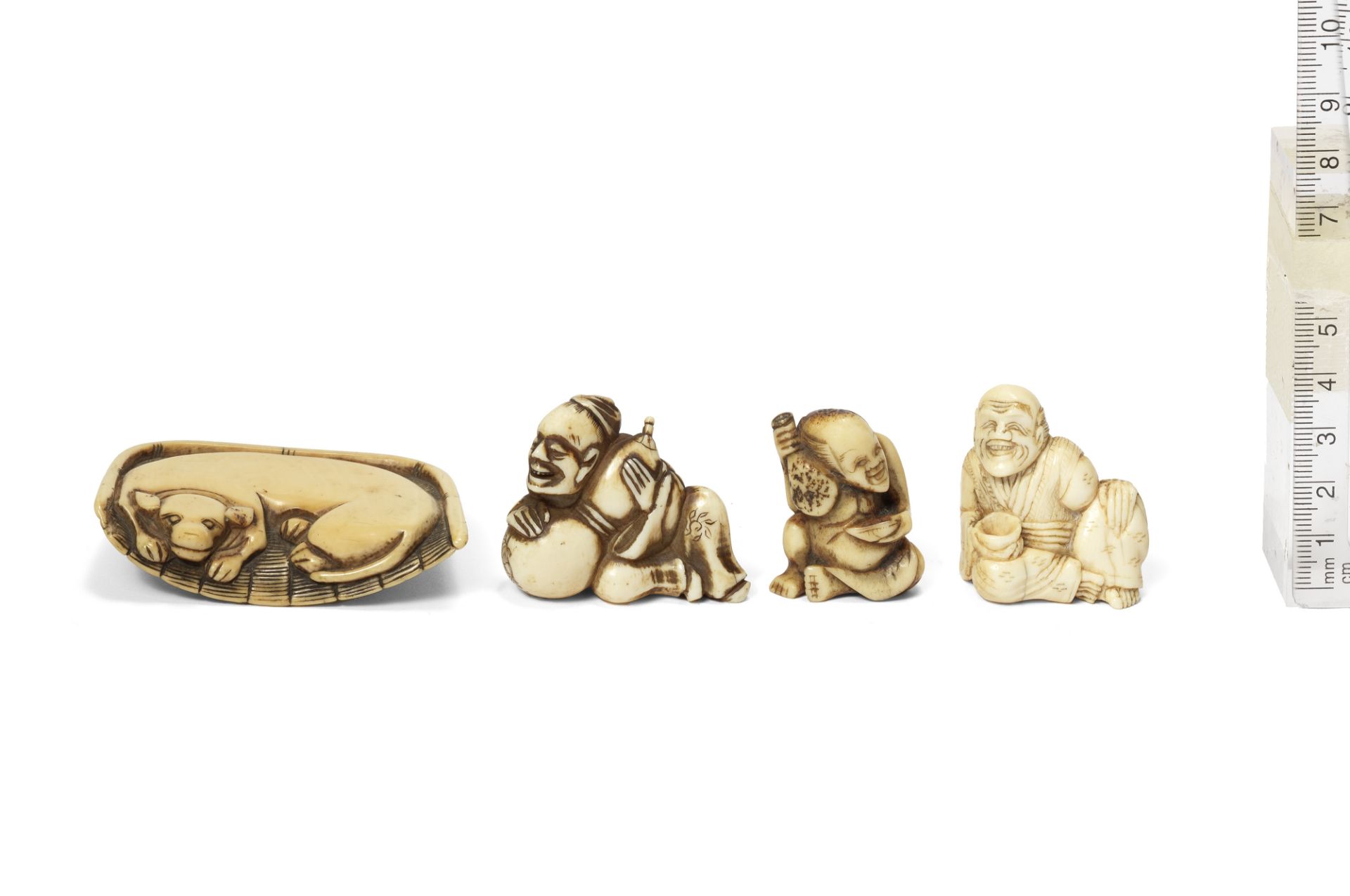 Three ivory and one stag-antler netsuke One by Masatomo, late 18th to early 19th century (4)