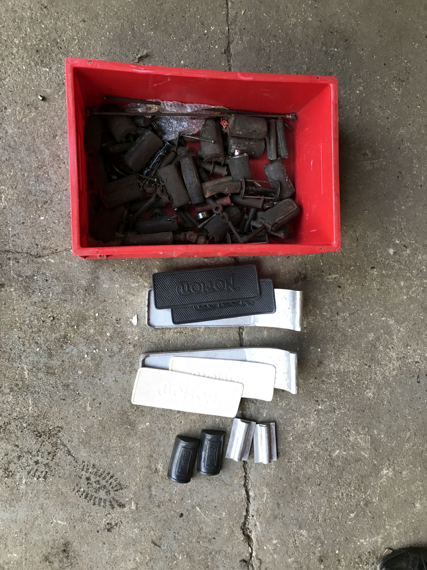 A selection of footrests, footrest parts, rubbers