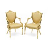 A pair of George III carved giltwood open armchairs In the manner of James Wyatt (2)