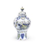 A large Dutch Delft baluster vase and cover, De Paauw factory, circa 1700