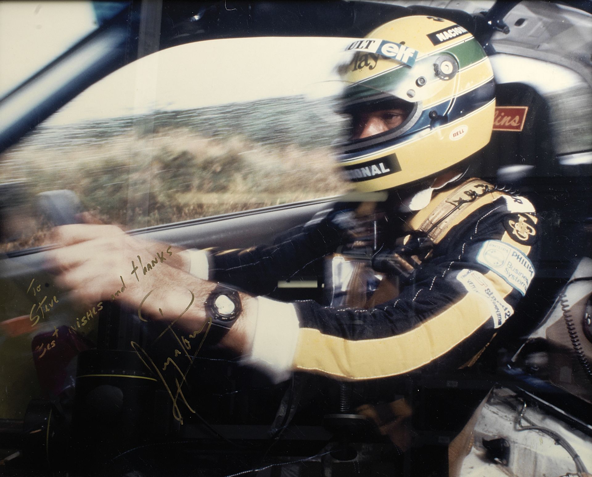 A signed photograph of Ayrton Senna in an RS Cosworth Rally car, 1986, One of ten examples, ((6))